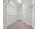 Walk in closet with wall to wall shelving for optimal storage at 817 Digby Rd, Rock Hill, SC 29730