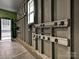 Garage interior showing wall-mounted organizers with hooks, baskets, and shelves for efficient storage at 817 Digby Rd, Rock Hill, SC 29730