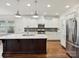 Bright kitchen with stainless steel appliances, a central island, and ample counter space at 817 Digby Rd, Rock Hill, SC 29730
