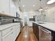 Well-equipped kitchen with stainless steel appliances, modern fixtures and a pantry at 817 Digby Rd, Rock Hill, SC 29730