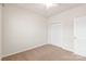 Bedroom featuring carpet, a ceiling fan and a double-door closet at 8500 Union Central Ct, Waxhaw, NC 28173