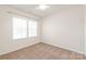 Bedroom with carpet, neutral walls, a ceiling fan and lots of natural light at 8500 Union Central Ct, Waxhaw, NC 28173
