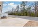 Long driveway provides ample parking with greenery and some trees in the background at 8500 Union Central Ct, Waxhaw, NC 28173