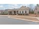 Street view of the home showing neighboring houses and landscaping at 8500 Union Central Ct, Waxhaw, NC 28173