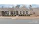 Charming home exterior with brick accents, neutral siding, and well-maintained landscaping at 8500 Union Central Ct, Waxhaw, NC 28173