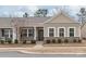 Charming home exterior with brick accents, neutral siding, and well-maintained landscaping at 8500 Union Central Ct, Waxhaw, NC 28173