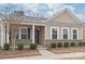 Inviting front exterior with well-manicured bushes and a welcoming front entrance at 8500 Union Central Ct, Waxhaw, NC 28173