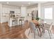 Open concept kitchen with stainless appliances, granite countertops, and a stylish island at 8500 Union Central Ct, Waxhaw, NC 28173