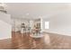 Open concept living space with kitchen and dining area and hardwood floors at 8500 Union Central Ct, Waxhaw, NC 28173