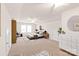 Staged main bedroom showcasing a neutral palette, decorative accents, and a comfortable atmosphere at 8500 Union Central Ct, Waxhaw, NC 28173