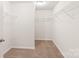 Large walk-in closet with carpet and wire shelving for ample storage at 8500 Union Central Ct, Waxhaw, NC 28173