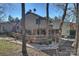 Exterior of the house with large back deck surrounded by a landscaped yard at 9005 St Croix Ln, Charlotte, NC 28277