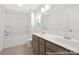 Bathroom featuring double sinks, tile flooring, and a shower-tub combo at 110 Shay Crossing Rd # 1P, Salisbury, NC 28144