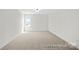 Carpeted bedroom with one window at 110 Shay Crossing Rd # 1P, Salisbury, NC 28144