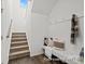 Welcoming entryway features a bench with pillows and hooks, leading to the staircase at 110 Shay Crossing Rd # 1P, Salisbury, NC 28144