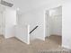 Upstairs hallway with carpet and neutral walls at 110 Shay Crossing Rd # 1P, Salisbury, NC 28144