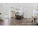 Bright kitchen boasts white cabinets, an island with seating, and stainless steel appliances at 110 Shay Crossing Rd # 1P, Salisbury, NC 28144