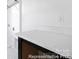 Bright laundry room with white countertop and convenient storage solutions, creating a practical space at 110 Shay Crossing Rd # 1P, Salisbury, NC 28144