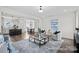 Open-concept living space with dining area, kitchen, and bright living room at 110 Shay Crossing Rd # 1P, Salisbury, NC 28144