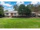 Charming brick home with well-manicured lawn and mature landscaping at 1101 S Wendover Rd, Charlotte, NC 28211