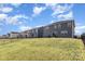 Grassy backyard featuring a black fence, perfect for outdoor activities at 1111 Fairbrae Ln, Indian Trail, NC 28079