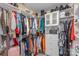 Spacious walk-in closet with built-in shelving and ample storage for clothes and accessories at 1111 Fairbrae Ln, Indian Trail, NC 28079