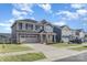 Charming two-story home with a two car garage and well-manicured lawn at 1111 Fairbrae Ln, Indian Trail, NC 28079