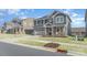 Charming two-story home with a two car garage and well-manicured lawn at 1111 Fairbrae Ln, Indian Trail, NC 28079