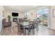 Cozy living room and dining area with fireplace and sliding glass door at 1111 Fairbrae Ln, Indian Trail, NC 28079
