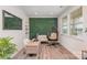 Stylish office space featuring a unique grass wall, modern furniture, and natural light at 1111 Fairbrae Ln, Indian Trail, NC 28079