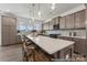 Spacious kitchen with a large island, pendant lights, and modern appliances offering an open layout at 112 Stonewater Dr # 33P, Red Cross, NC 28129