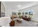 Inviting living room featuring natural light, stylish decor, comfortable seating, and hardwood flooring at 112 Stonewater Dr # 33P, Red Cross, NC 28129