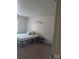 Minimalist bedroom with neutral walls and carpet at 115 Eastcliff Se Dr # 4, Concord, NC 28025