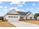 Charming home with a two-car garage and well-manicured lawn at 120 Random Dr, Salisbury, NC 28147