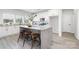 Bright kitchen features granite countertops, white cabinets, stainless appliances, and a central island at 120 Random Dr, Salisbury, NC 28147
