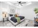 Comfortable main bedroom with a large bed, tray ceiling and neutral decor at 120 Random Dr, Salisbury, NC 28147