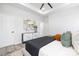 Tastefully decorated main bedroom with a ceiling fan, artwork and ensuite bathroom at 120 Random Dr, Salisbury, NC 28147