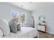 Bright bedroom featuring large windows and modern decor at 228 Chestnut St # 66, Shelby, NC 28150