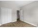 Neutral bedroom with closet space and a view into the bathroom at 228 Chestnut St # 66, Shelby, NC 28150