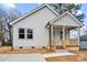 Charming home with a cozy front porch and well-manicured lawn at 228 Chestnut St # 66, Shelby, NC 28150