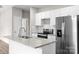 Modern kitchen features stainless appliances, gray granite countertops, and white cabinets at 228 Chestnut St # 66, Shelby, NC 28150