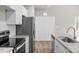 Well-equipped kitchen with stainless steel appliances, a subway tile backsplash, and stone countertops at 228 Chestnut St # 66, Shelby, NC 28150