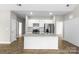 Spacious kitchen with a center island, stainless appliances, white cabinetry, and a subway tile backsplash at 228 Chestnut St # 66, Shelby, NC 28150