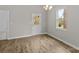 Light-filled living space with wood floors, neutral wall colors, and a view of the outdoors at 228 Chestnut St # 66, Shelby, NC 28150