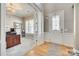 Elegant foyer showcasing hardwood floors, a decorative front door, and an adjacent office space at 658 Quicksilver Trl, Fort Mill, SC 29708