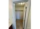 Large closet featuring ample storage space, rod and tile flooring at 6901 Green Haven Ln, Monroe, NC 28110