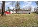 Expansive backyard with a view of the home's exterior, offering a glimpse of outdoor living potential at 1148 Rita Ave, Statesville, NC 28677