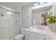 Updated bathroom featuring a glass enclosed shower, white vanity with marble countertop, and modern fixtures at 121 Easter Ln, Davidson, NC 28036