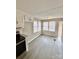 Bright dining space with new gray floors and multiple windows at 1718 Fallston Rd, Shelby, NC 28150