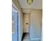 Entryway utility closet with access to house systems and room for storage at 1718 Fallston Rd, Shelby, NC 28150